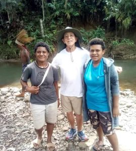 Elderly Tourist with 2 local PNG Girls Cropped